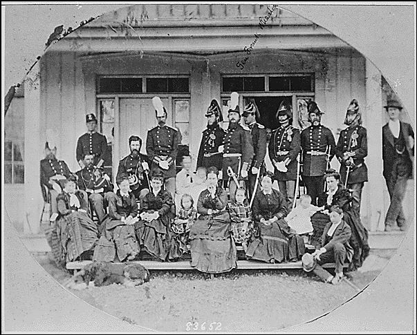 Historic photo of Fort Walla Walla with group outside front doors